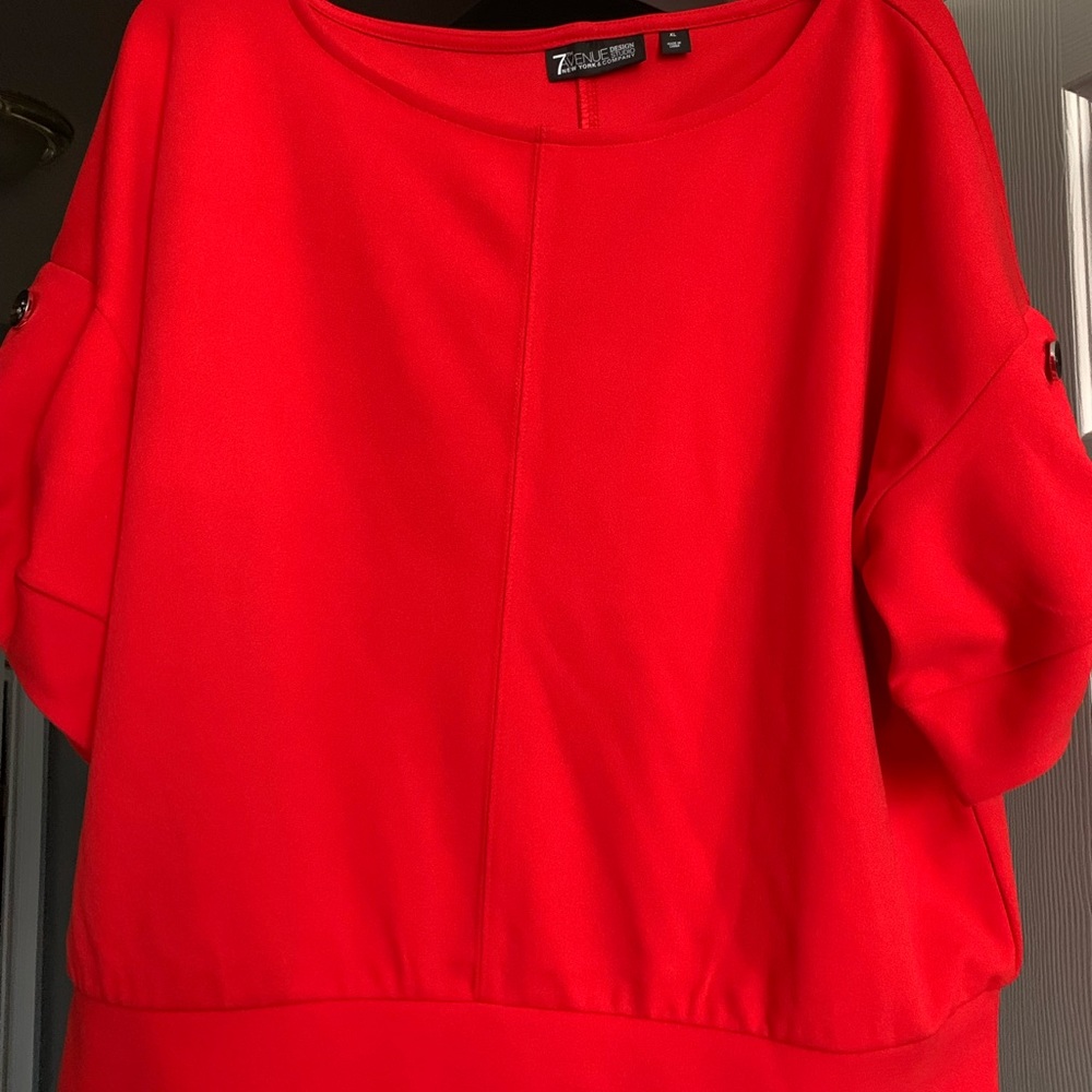 7th Avenue from New York & Company. Deep orange career blouse; 3/4 sleeves.